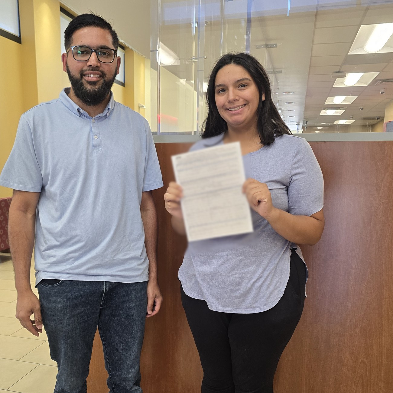 Seller completing a DMV title transfer with South OC Autos in Orange County